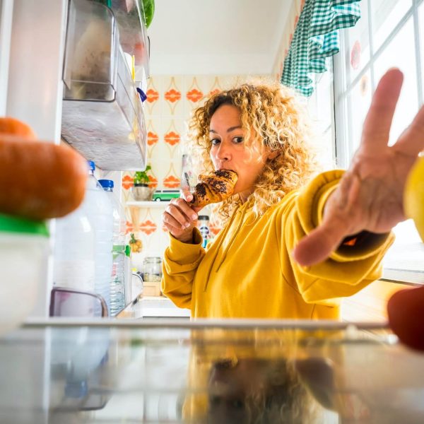 hungry-beautiful-adult-young-woman-opening-the-fridge-1.jpg